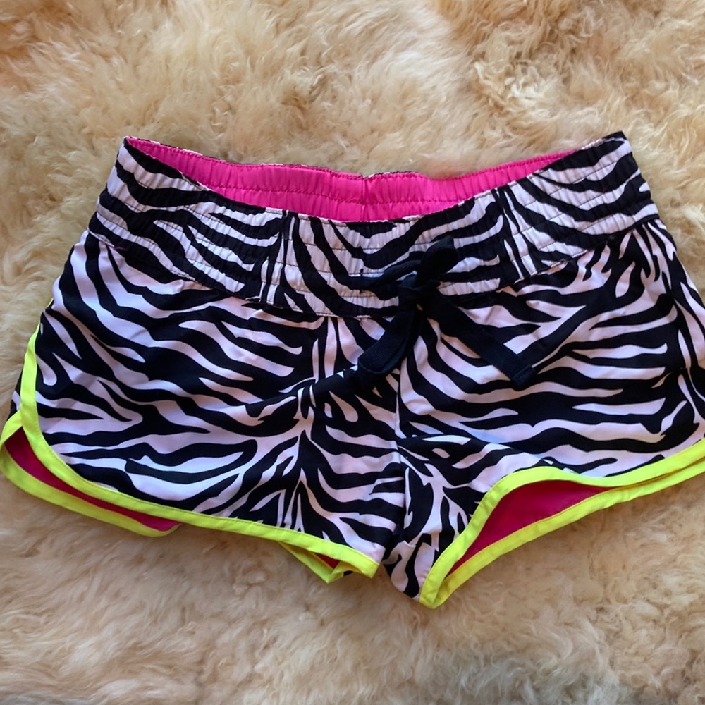 Women’s size small reversible zebra & pink short shorts